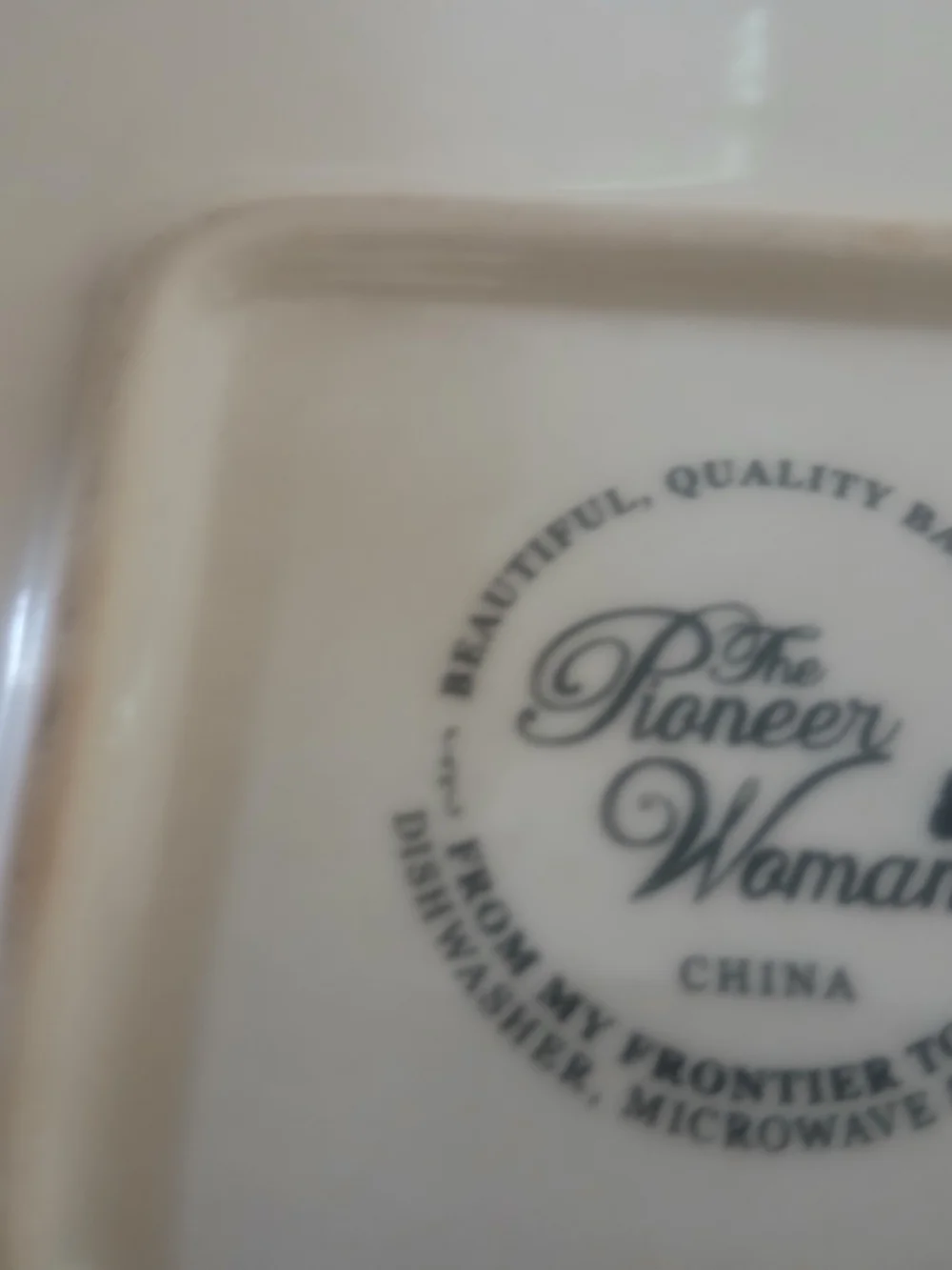 The Pioneer Woman Cream Ceramic Dish with Black Logo